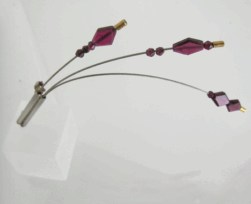 <em>Johnsonia Trembler III - Wildflower Collection, </em>brooch, Sterling silver, 18ct gold, steel, Rhodalite garnet facetted, 5 x 13 x 0.8cm, no 0661m.