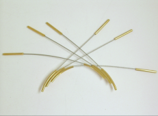 <em>Little Golden Brolgas - The Birds, pair of brooches, </em>18ct gold, and stainless-steel cable. Can be worn many ways, 10 x 15 x 0.7cm, no 0601b.