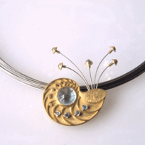 <em>Aquamarine Nautilus - Seashore Collection,</em> Brooch/pendant, 18ct gold, aquamarine, blue topaz, no 0623d on steel multi-strand neckring with 18ct gold bayonet catch Gathman no 6 85/418/e, 15 x 16 x 2.5cm, no 0623d.