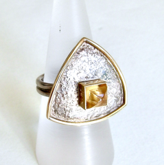 <em>Citrine Shield,</em> ring, citrine trillion cabochon,18ct gold, sterling silver, size M, no 1105b.