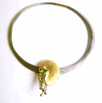 <em>Colourful Nautilus - Seashore Collection, </em>Brooch/pendant, 18ct yellow gold, rubies, amethyst, green garnet, tourmaline, steel cable 0622b on Gathman multistrand in 18ct and steel no 6 85/418/e, 15.5 x 19 x 2.0cm. no 0622g.